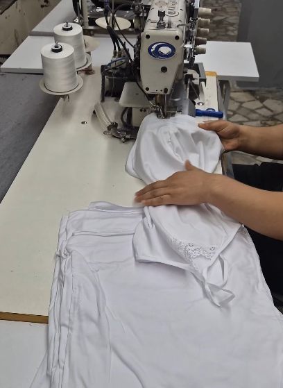 Sewing cut panels together into finished garments